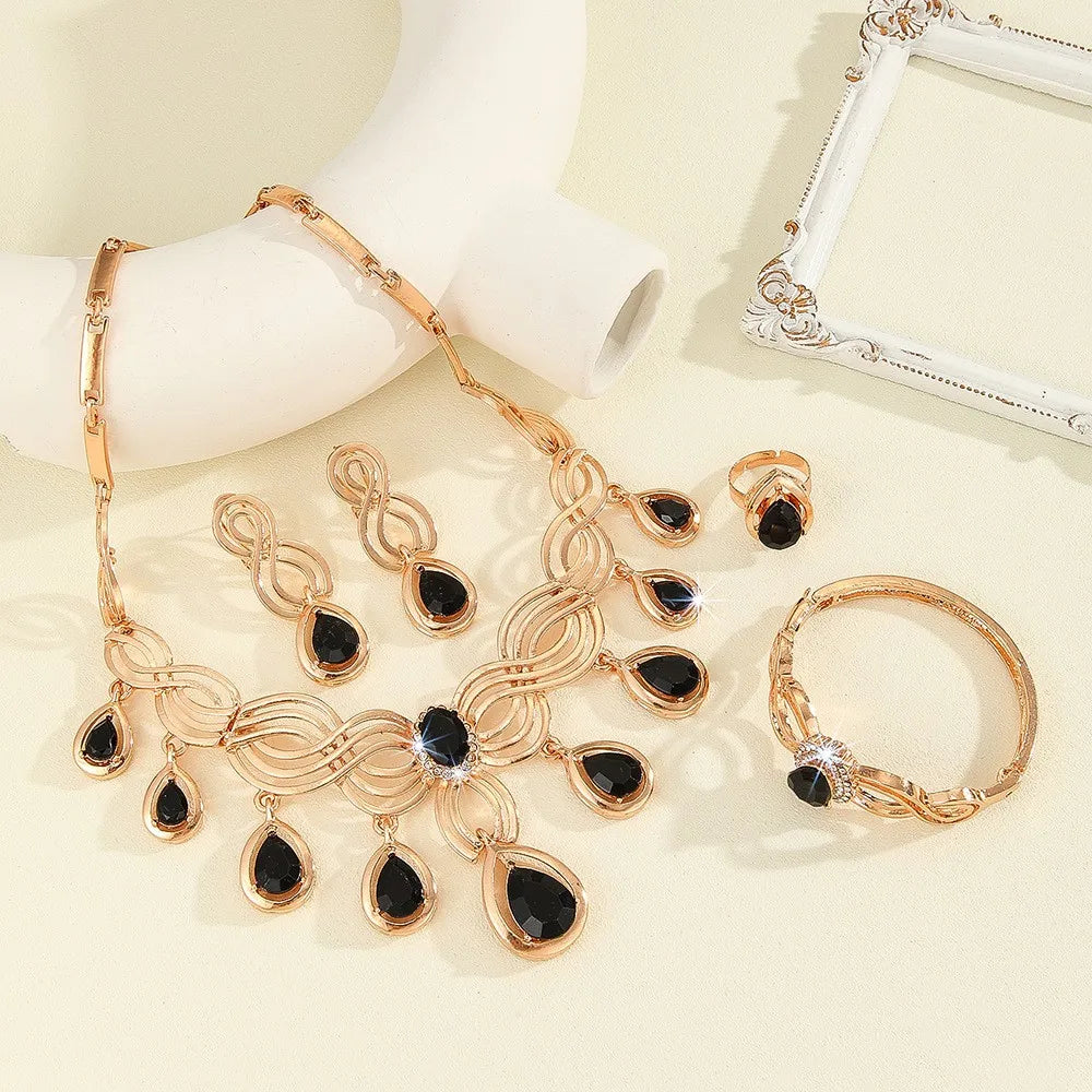 Exaggerated Cross-Border Jewelry Set with Black Resin and Gold-Tone Rhinestones: Necklace, Earrings, Ring, and Bracelet for Women, Wedding Style, Unique Design